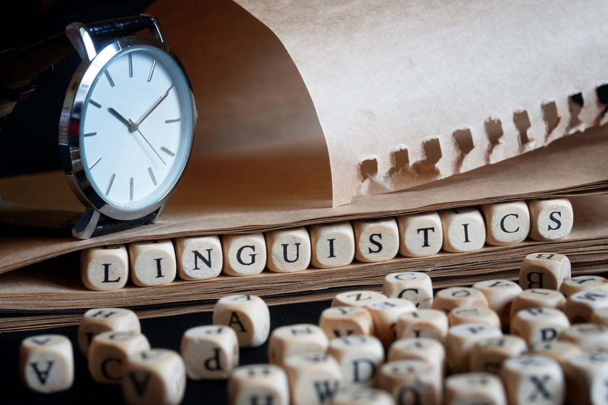 Word: Linguistics Next To Letters, Wristwatch And Notepad. The Concept Of Scientific Research In Linguistics And The History Of Language, The Study Of Linguistics In School Or College